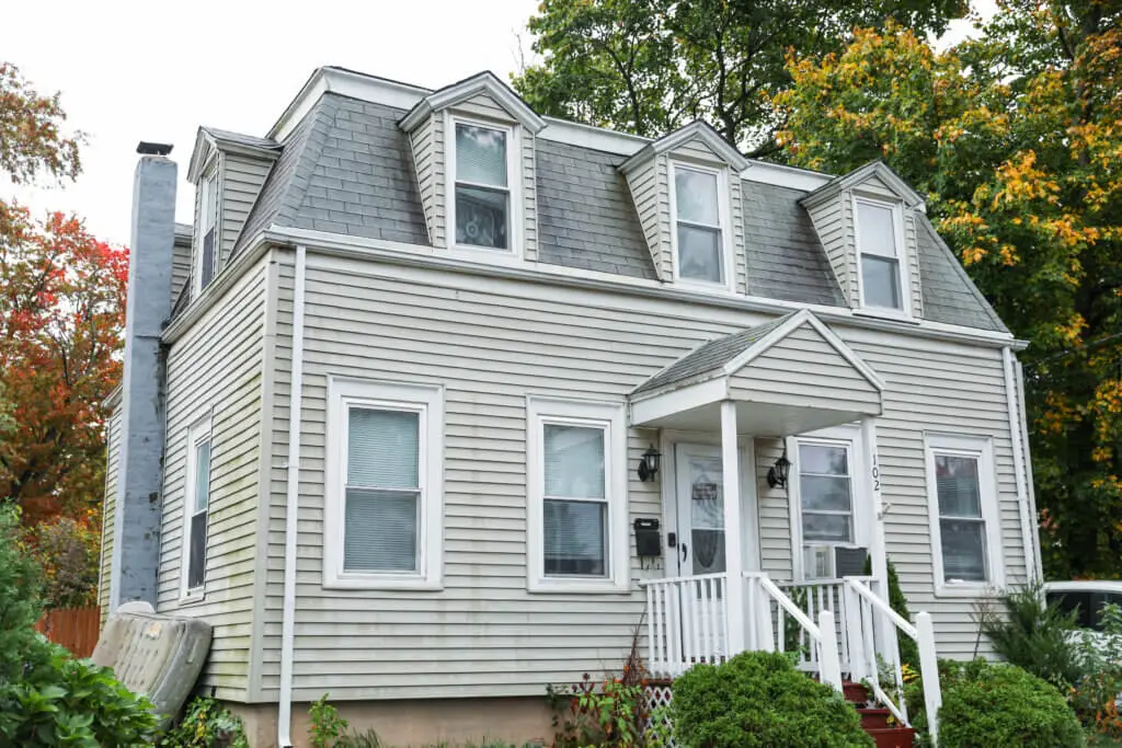 A house with a porch and stairs
