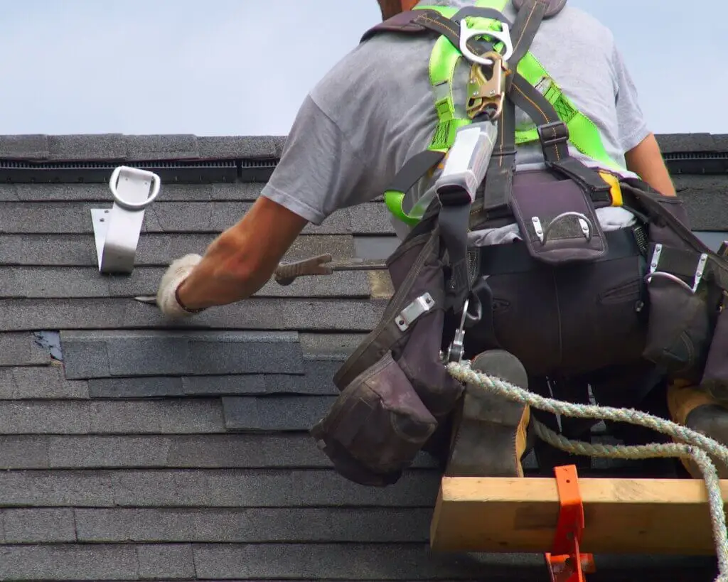 A man working on a roof