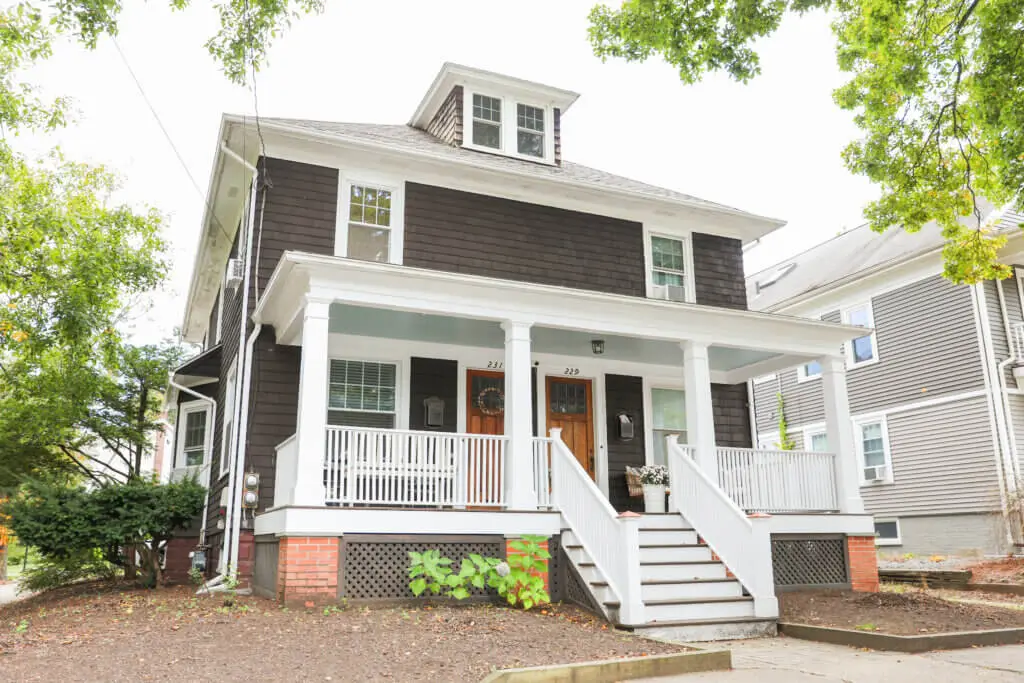A house with a porch and stairs